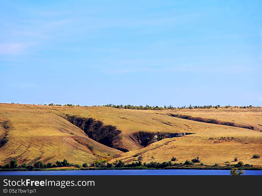 Summer landscape with mountains and ravine