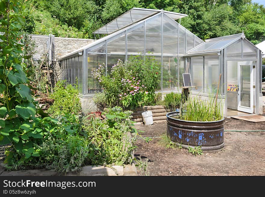 Greenhouse in garden center with trees