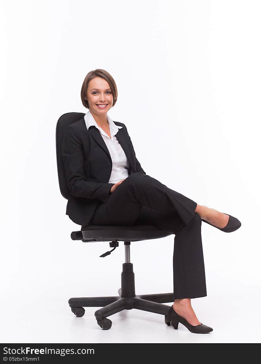 Businesswoman sit on chair isolated with white