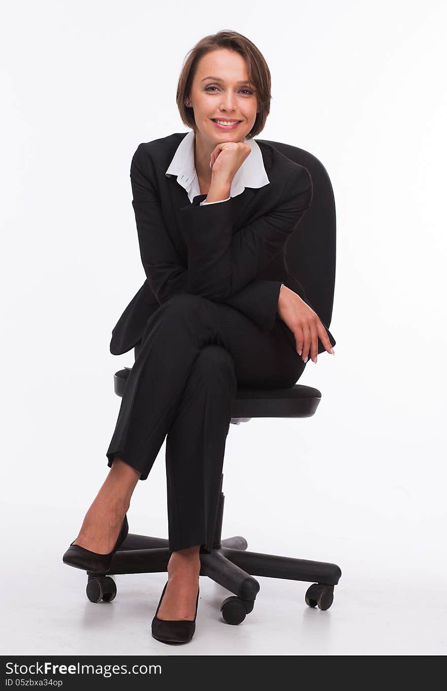 Businesswoman sit on chair isolated with white