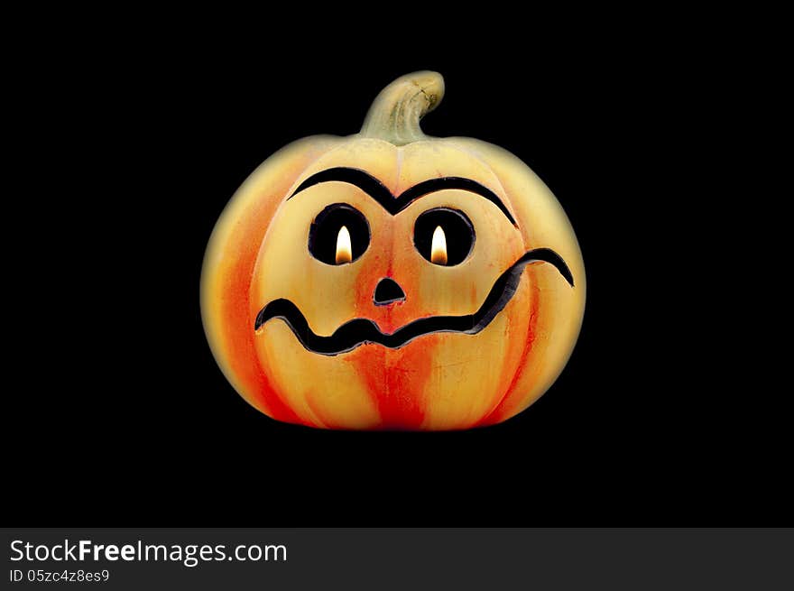 Ceramic Halloween Jack O'lantern, with candle flame for eyes. Ceramic Halloween Jack O'lantern, with candle flame for eyes