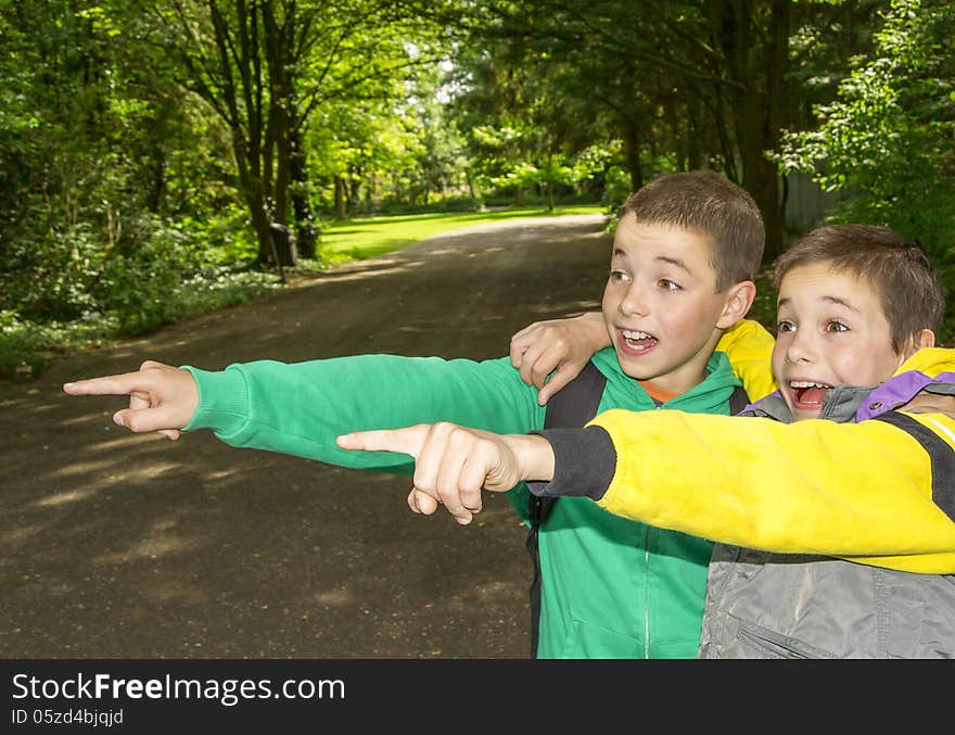 Portrait of two hugging boys, tweens