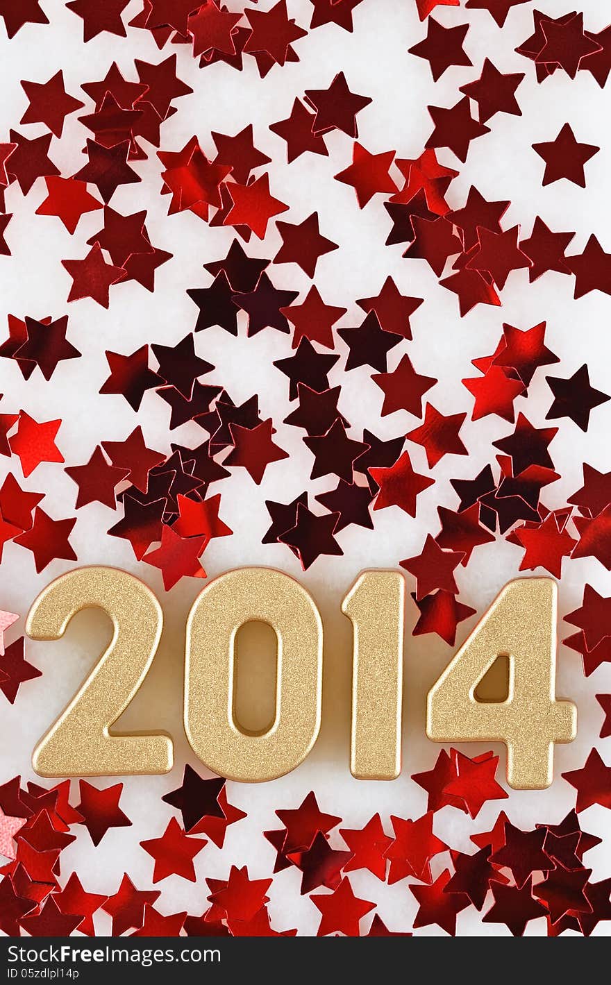 2014 year golden figures on the background of red stars