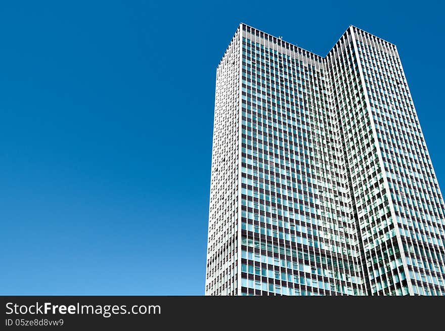 Single Skyscraper Office Block against Clear Blue Sky. Single Skyscraper Office Block against Clear Blue Sky