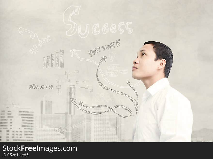 Asian Businessman Looking Up To Success Concept And Ideas. Asian Businessman Looking Up To Success Concept And Ideas