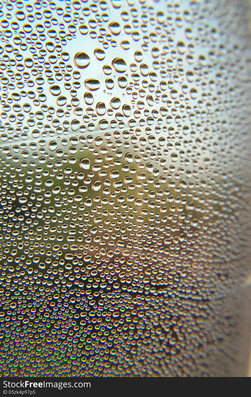 Drops of water on the crooked glass, shallow dof