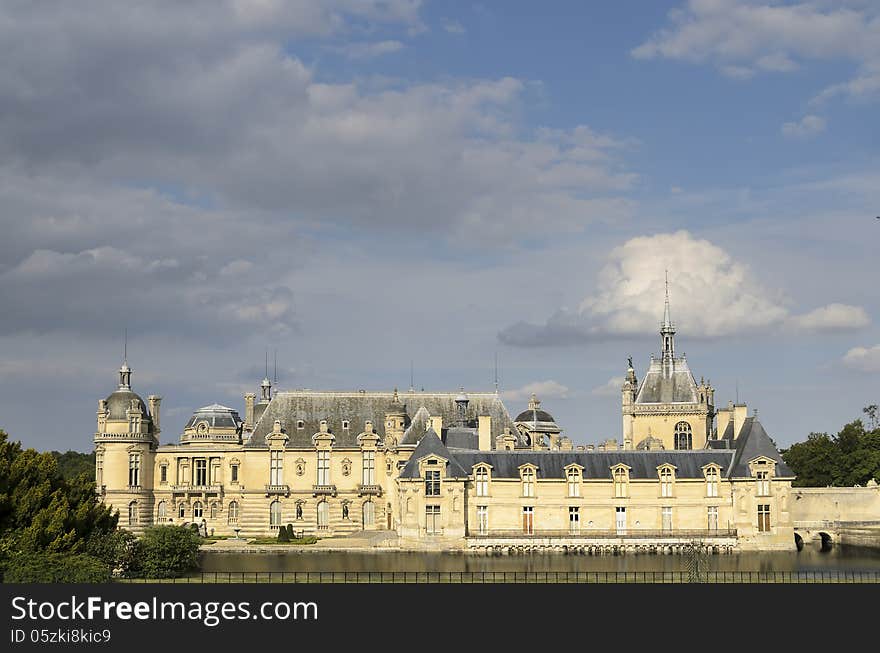 Chantilly is a commune in the Oise department in the valley of the Nonette in the Picardy region of northern France. Surrounded by Chantilly Forest, the town of 11,000 inhabitants falls within the metropolitan area of Paris. It lies 38.4 km. (23.9 miles) north-northeast from the centre of Paris and together with six neighbouring communes forms an urban area of 36,474 inhabitants (1999 census). Intimately tied to the House of Montmorency in the 15th to 17th centuries, the ChÃ¢teau de Chantilly was home to the princes of CondÃ©, cousins of the kings of France, from the 17th to the 19th centuries. It now houses the MusÃ©e CondÃ©. Chantilly is also known for its horse racing track, the Chantilly Racecourse, where prestigious races are held for the prix du Jockey Club and the prix de Diane. Chantilly and the surrounding communities are home to the largest racehorse-training community in France. Chantilly is also home to the Living Museum of the Horse, with stables built by the Princes of CondÃ©. It is considered one of the more important tourist destinations in the Paris area. Chantilly gave its name to Chantilly cream, popularised by the maÃ®tre d'hÃ´tel of the princes of CondÃ©, FranÃ§ois Vatel, and to Chantilly lace. Chantilly is a commune in the Oise department in the valley of the Nonette in the Picardy region of northern France. Surrounded by Chantilly Forest, the town of 11,000 inhabitants falls within the metropolitan area of Paris. It lies 38.4 km. (23.9 miles) north-northeast from the centre of Paris and together with six neighbouring communes forms an urban area of 36,474 inhabitants (1999 census). Intimately tied to the House of Montmorency in the 15th to 17th centuries, the ChÃ¢teau de Chantilly was home to the princes of CondÃ©, cousins of the kings of France, from the 17th to the 19th centuries. It now houses the MusÃ©e CondÃ©. Chantilly is also known for its horse racing track, the Chantilly Racecourse, where prestigious races are held for the prix du Jockey Club and the prix de Diane. Chantilly and the surrounding communities are home to the largest racehorse-training community in France. Chantilly is also home to the Living Museum of the Horse, with stables built by the Princes of CondÃ©. It is considered one of the more important tourist destinations in the Paris area. Chantilly gave its name to Chantilly cream, popularised by the maÃ®tre d'hÃ´tel of the princes of CondÃ©, FranÃ§ois Vatel, and to Chantilly lace.