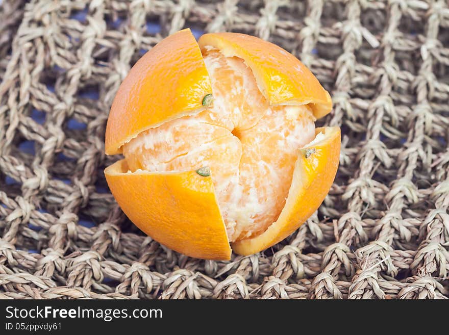 Peelling shell orange on weaving vine