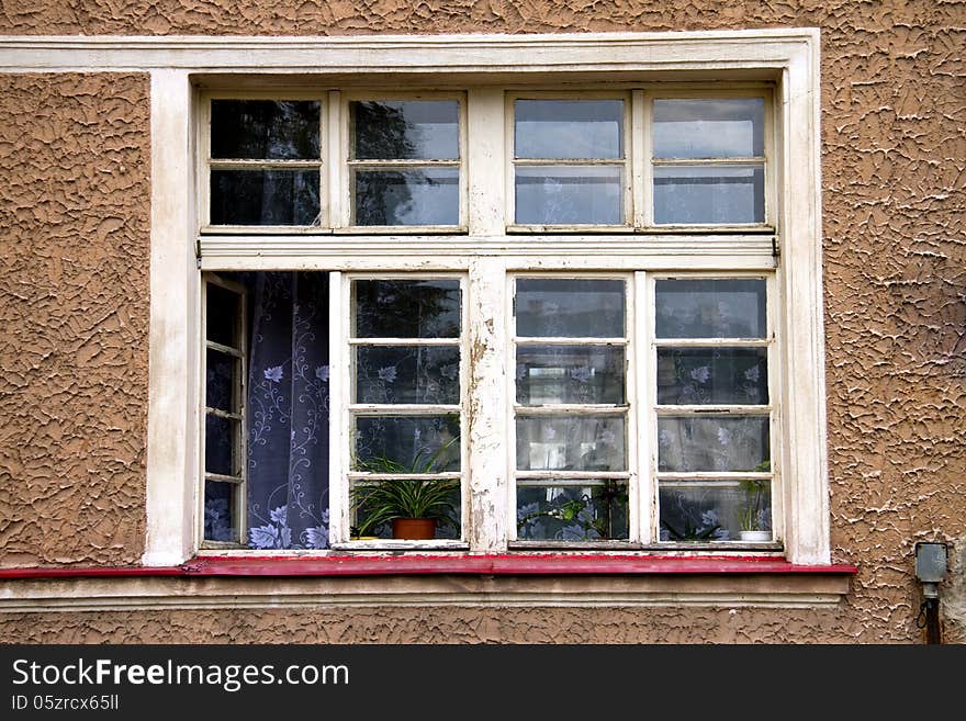 Old wooden window with one openend lattice. Old wooden window with one openend lattice