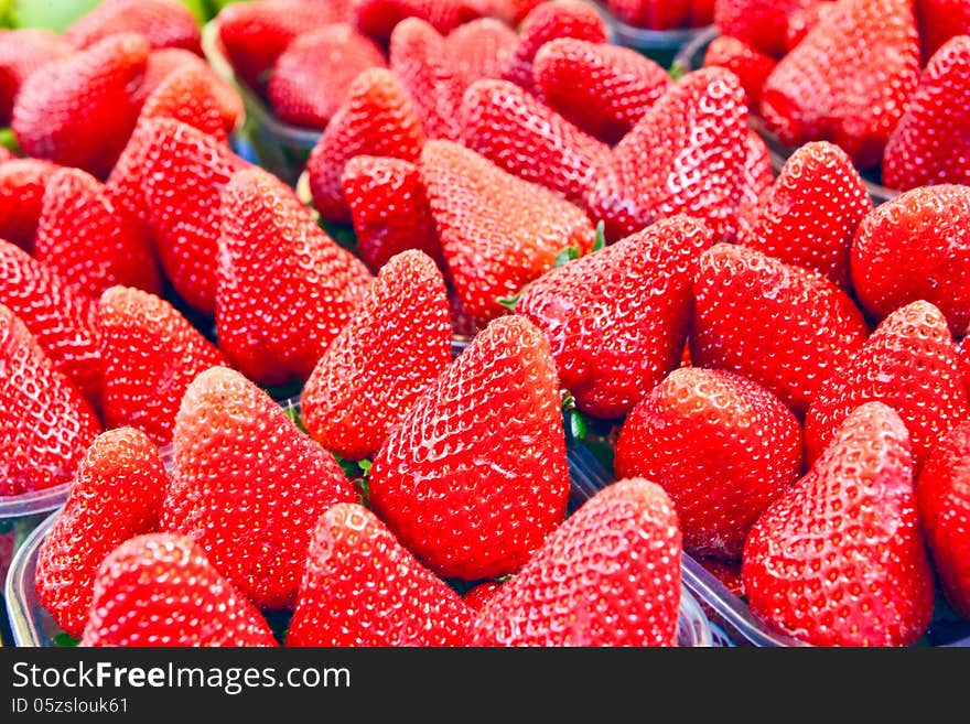 Strawberries in a box on the counter