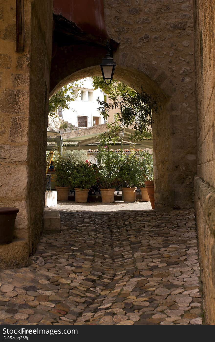 Cobbled entry and archway Moustiers France