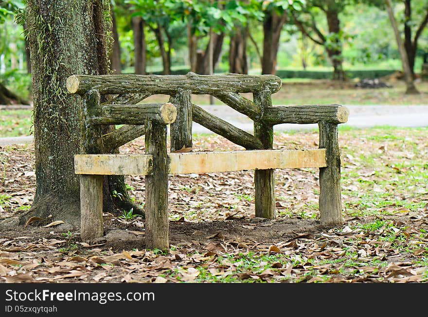 Bench alone setting in a park. Bench alone setting in a park