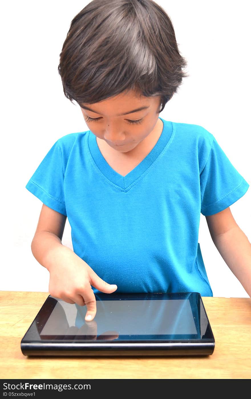 Little Boy Using Tablet