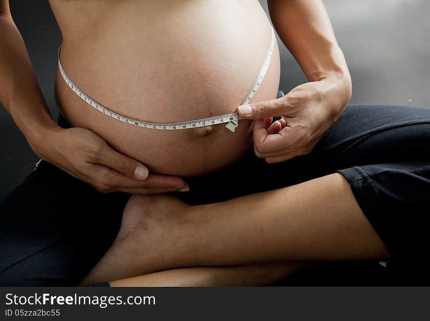 Asian pregnancy woman in studio. Asian pregnancy woman in studio