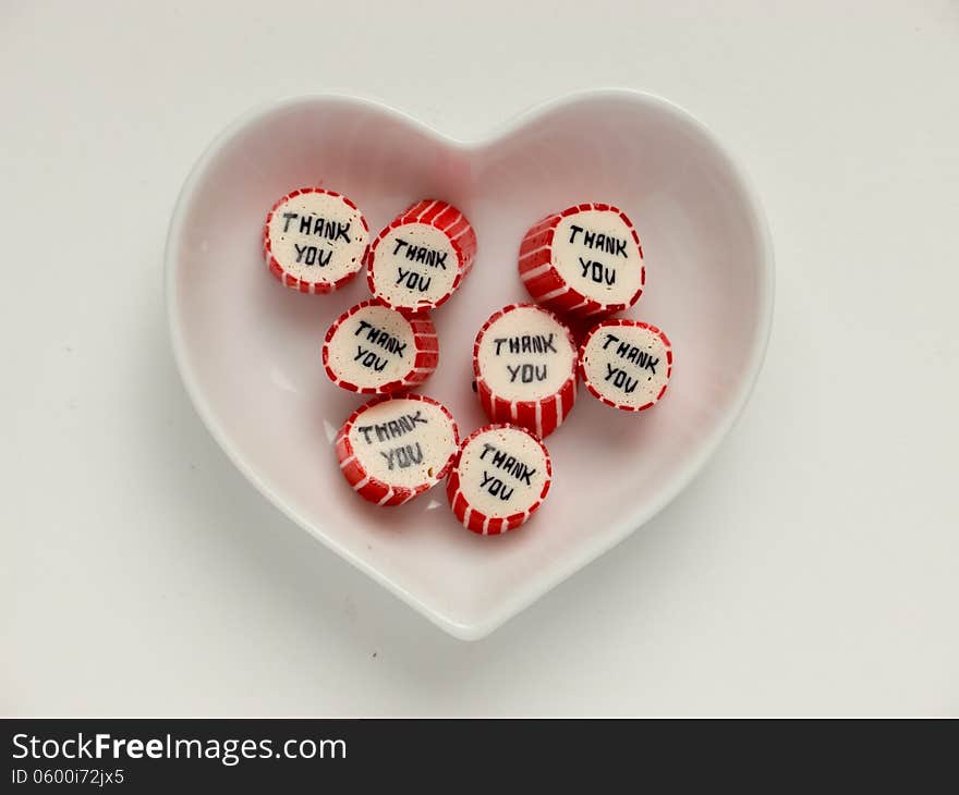 Heart-shaped plate with thank you candies