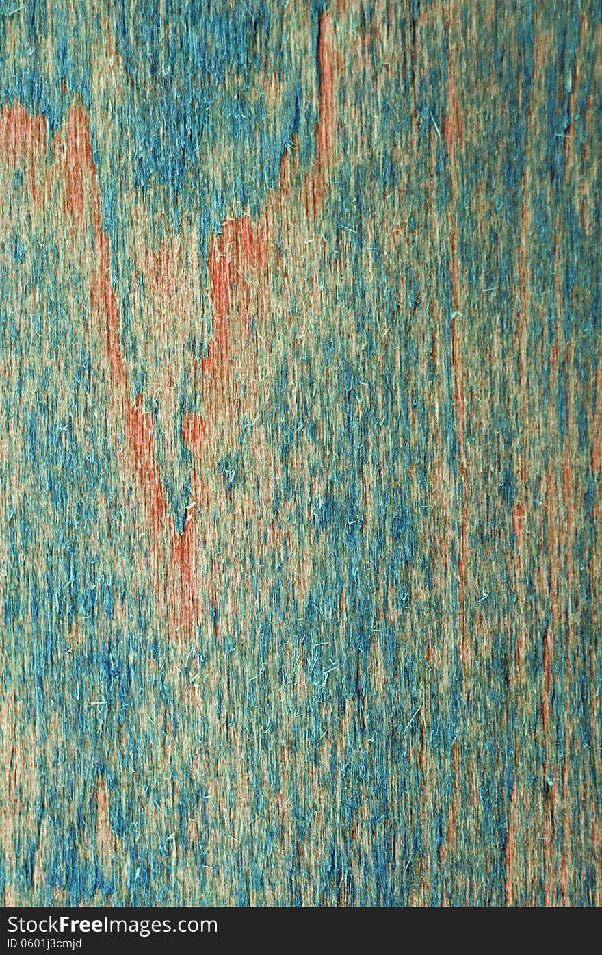 Vertical wooden background with blue and orange scratches. Vertical wooden background with blue and orange scratches