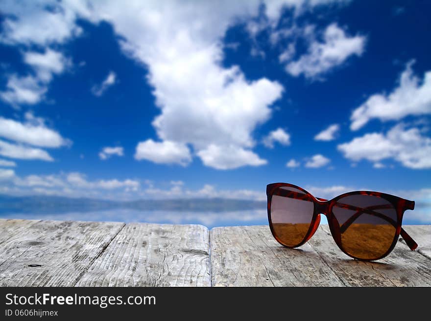 Summer vacation scene and sunglasses