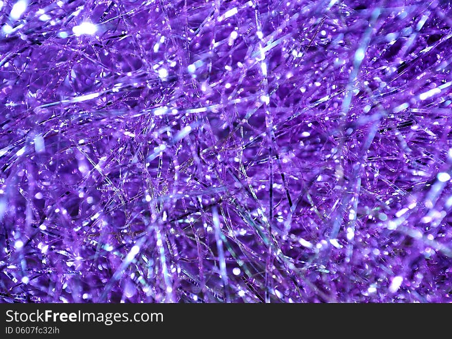 Violet shining holiday (New Year, Christmas) background with spangle and sparkles. Violet shining holiday (New Year, Christmas) background with spangle and sparkles
