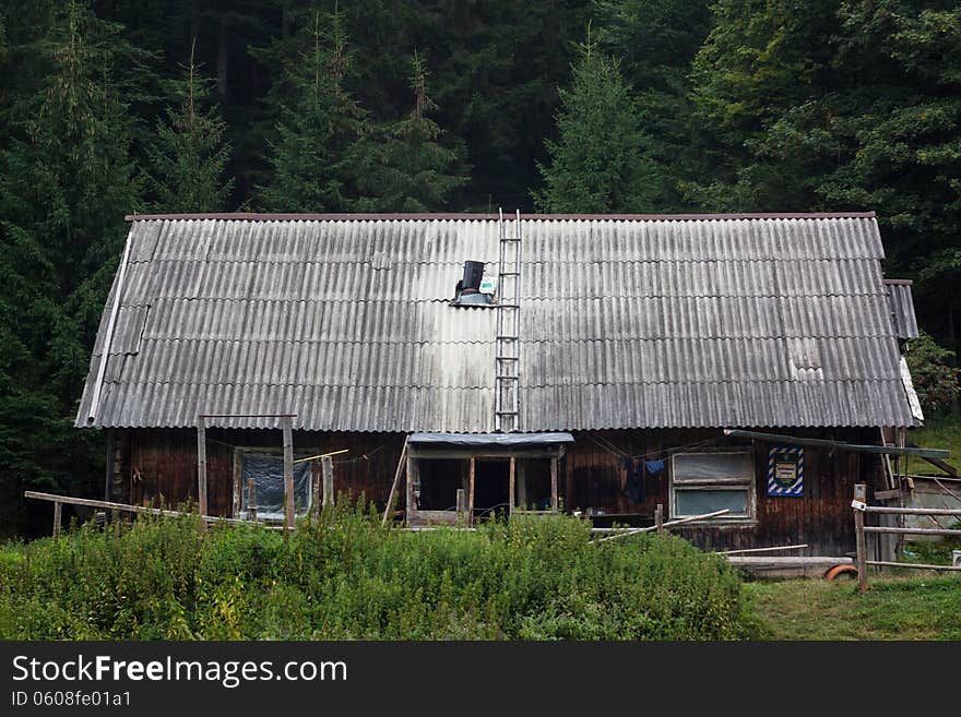 Old house in the woods. It has long been abandoned structure. Old house in the woods. It has long been abandoned structure.