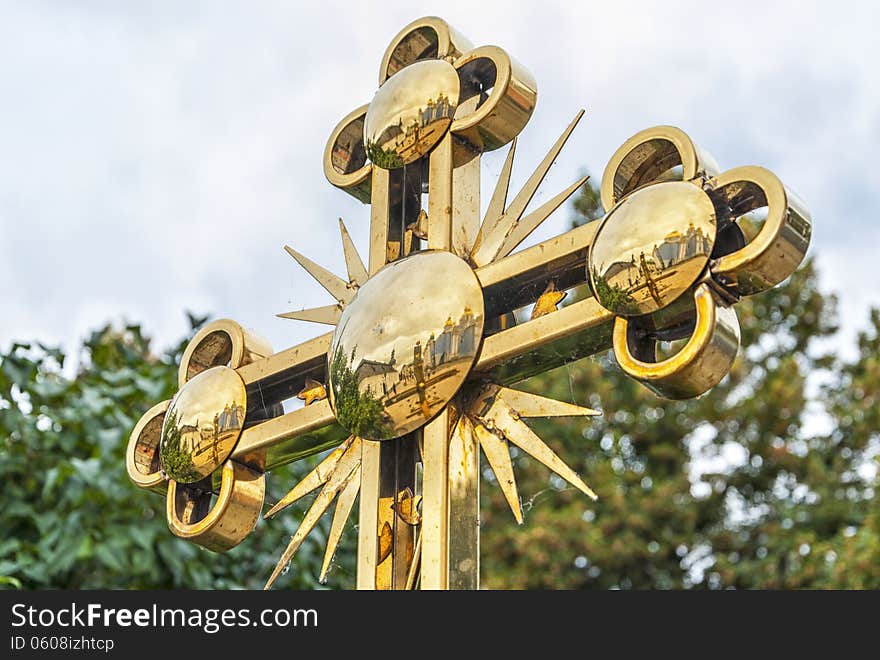 Golden orthodox cross details close up