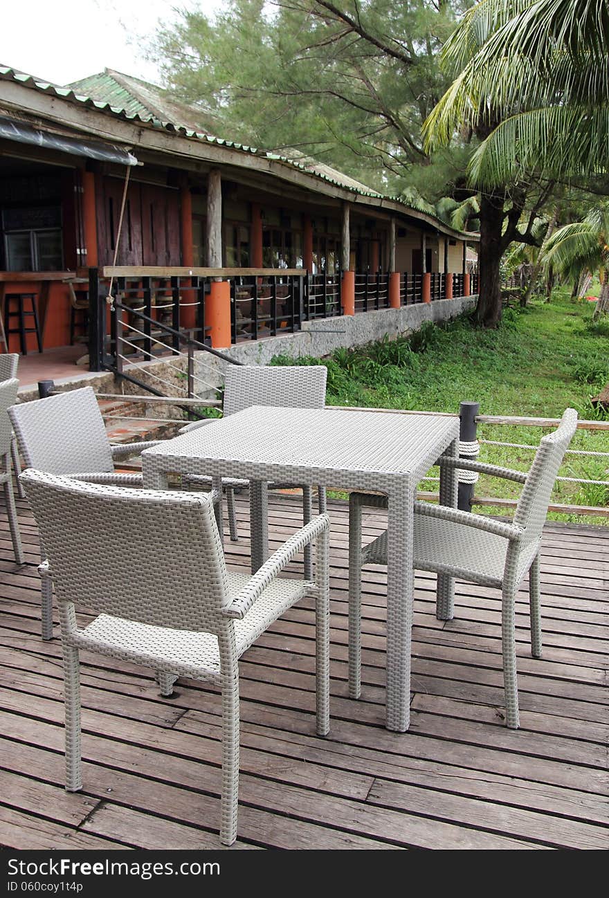 Restaurant With Tables And Chairs In Resort