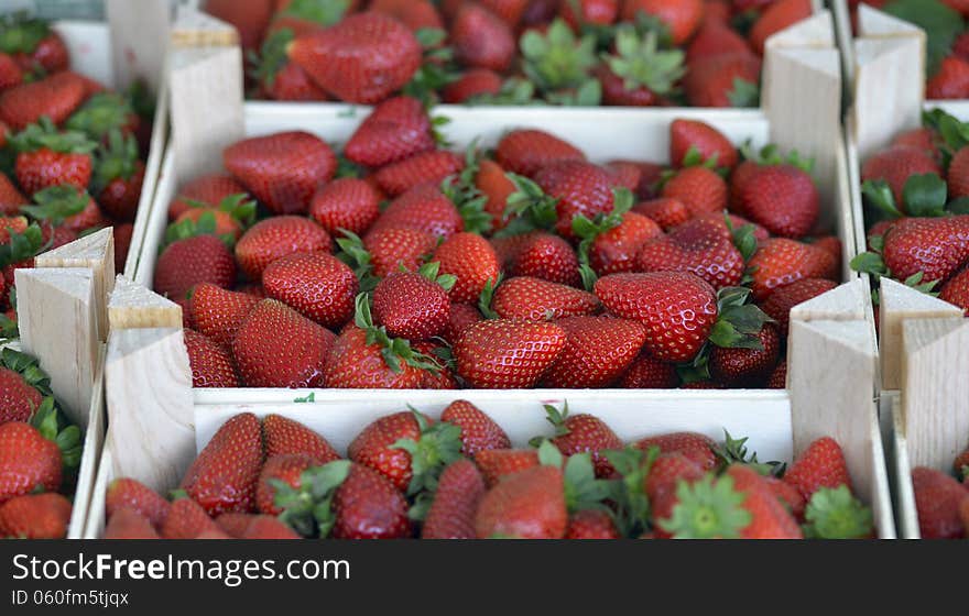 Strawberries in a box on the counter