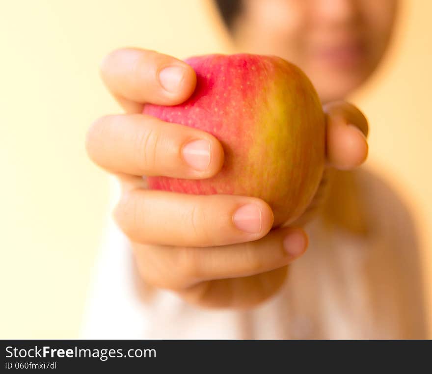 Closeup A Woman Holding A Apple