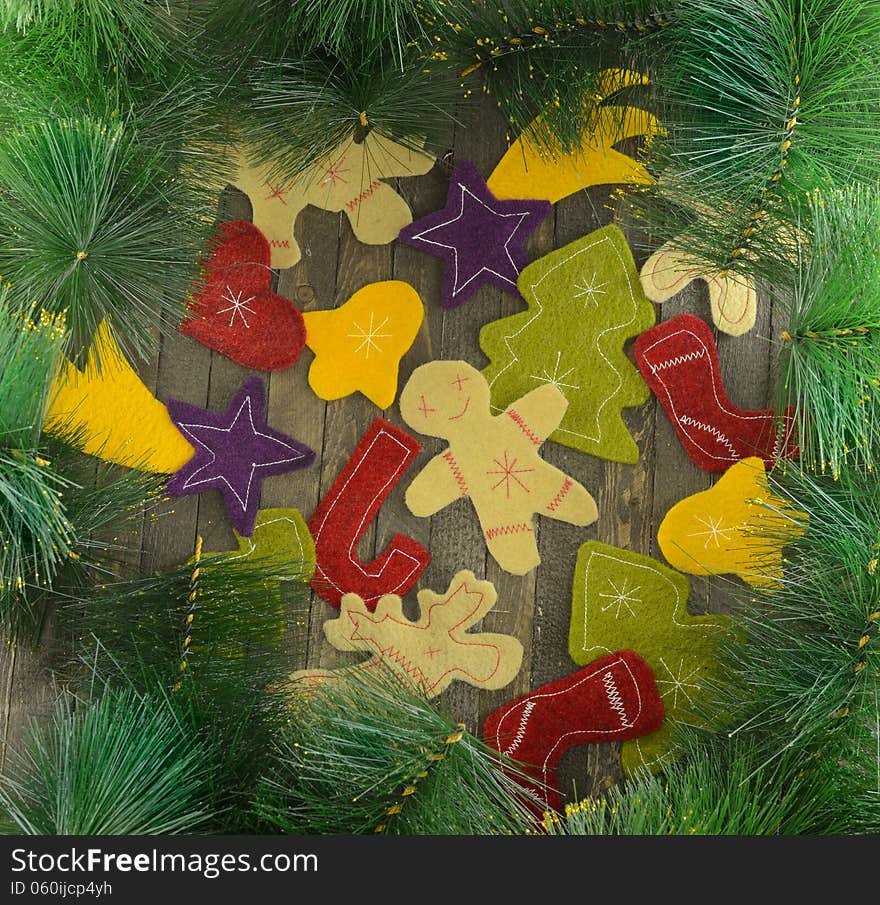 Christmas frame with funny figures and conifer branches. Christmas frame with funny figures and conifer branches