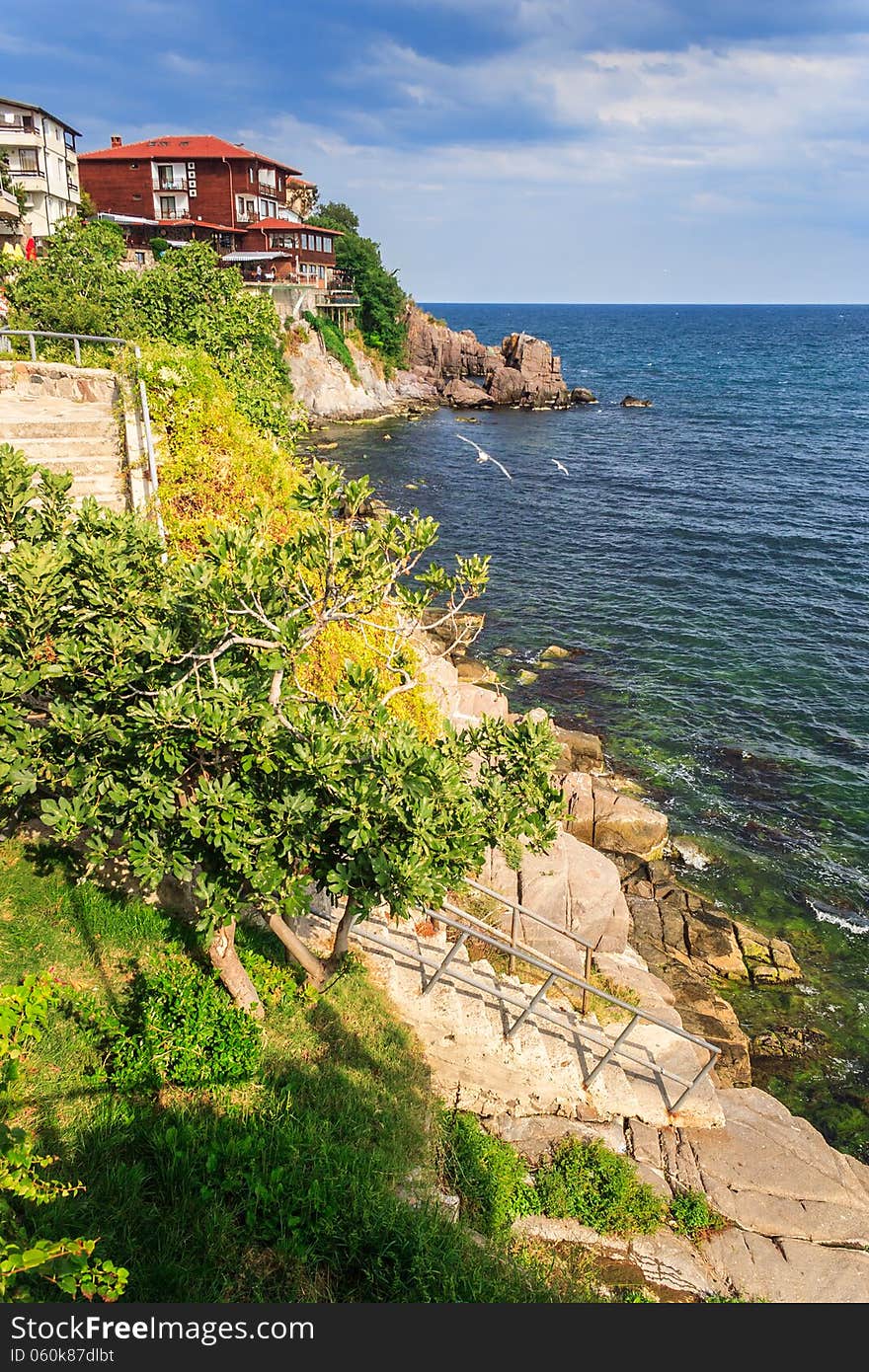 Steps to the rocky shore from the old town