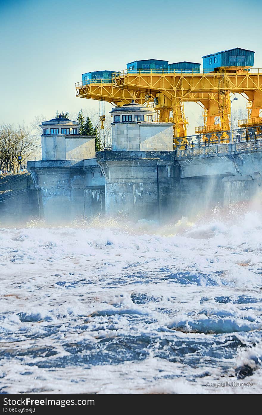 The dam on the Volga River, Spring 2013, draining the water draws the eye to the swirling flow. The dam on the Volga River, Spring 2013, draining the water draws the eye to the swirling flow