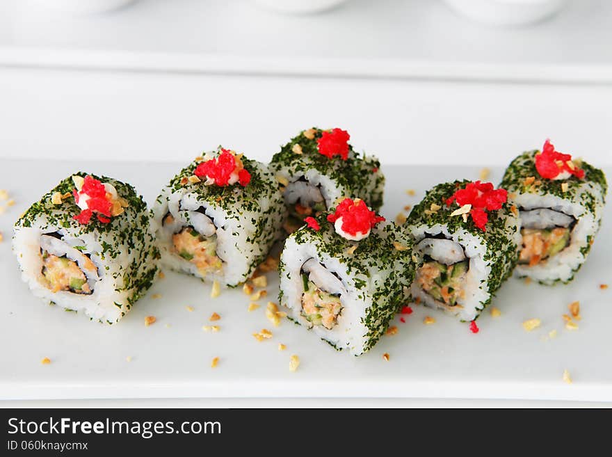 Colorful sushi on the plate in restaurant. Colorful sushi on the plate in restaurant