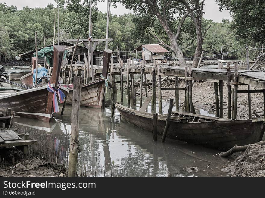 Environment around mangrove forest with wooden boats