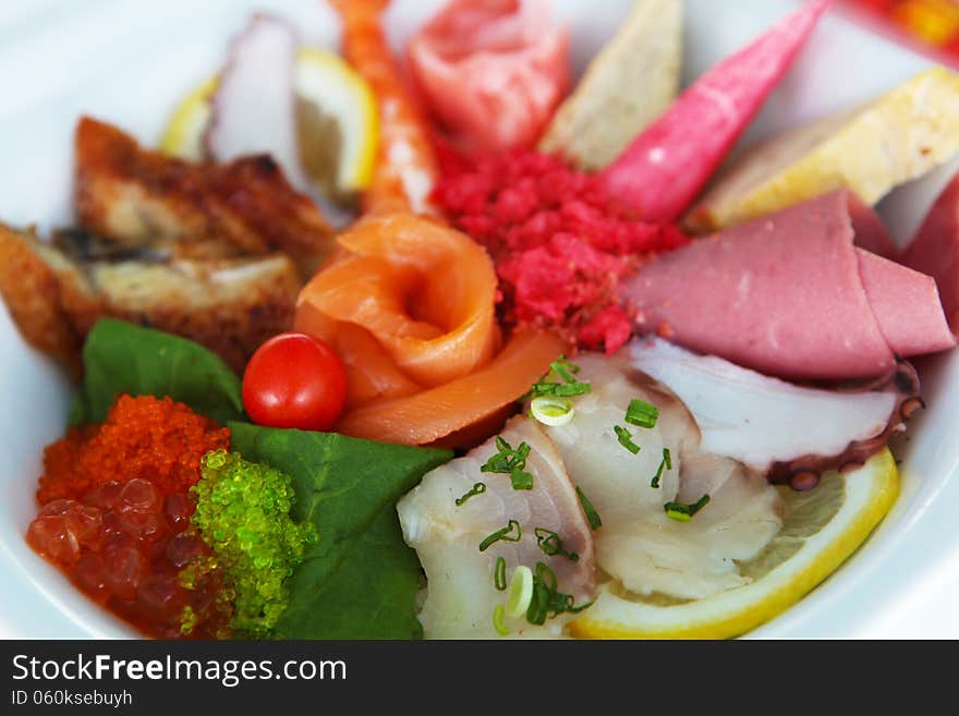 Mixed salad sushi on the plate in restaurant. Mixed salad sushi on the plate in restaurant