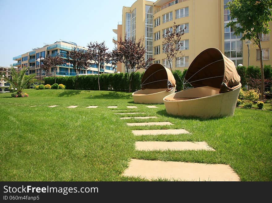 Lounge sofas in holiday resort garden