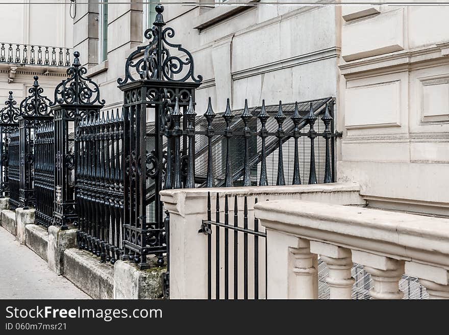 Victorian street black metal fence