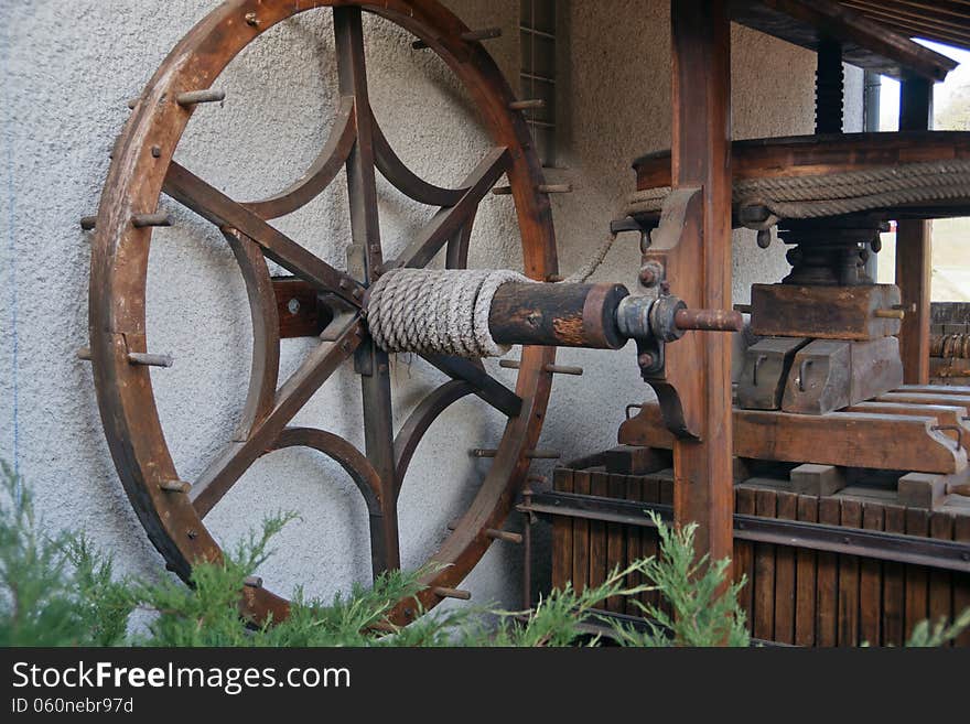 Old wooden wine press from another day. Old wooden wine press from another day.