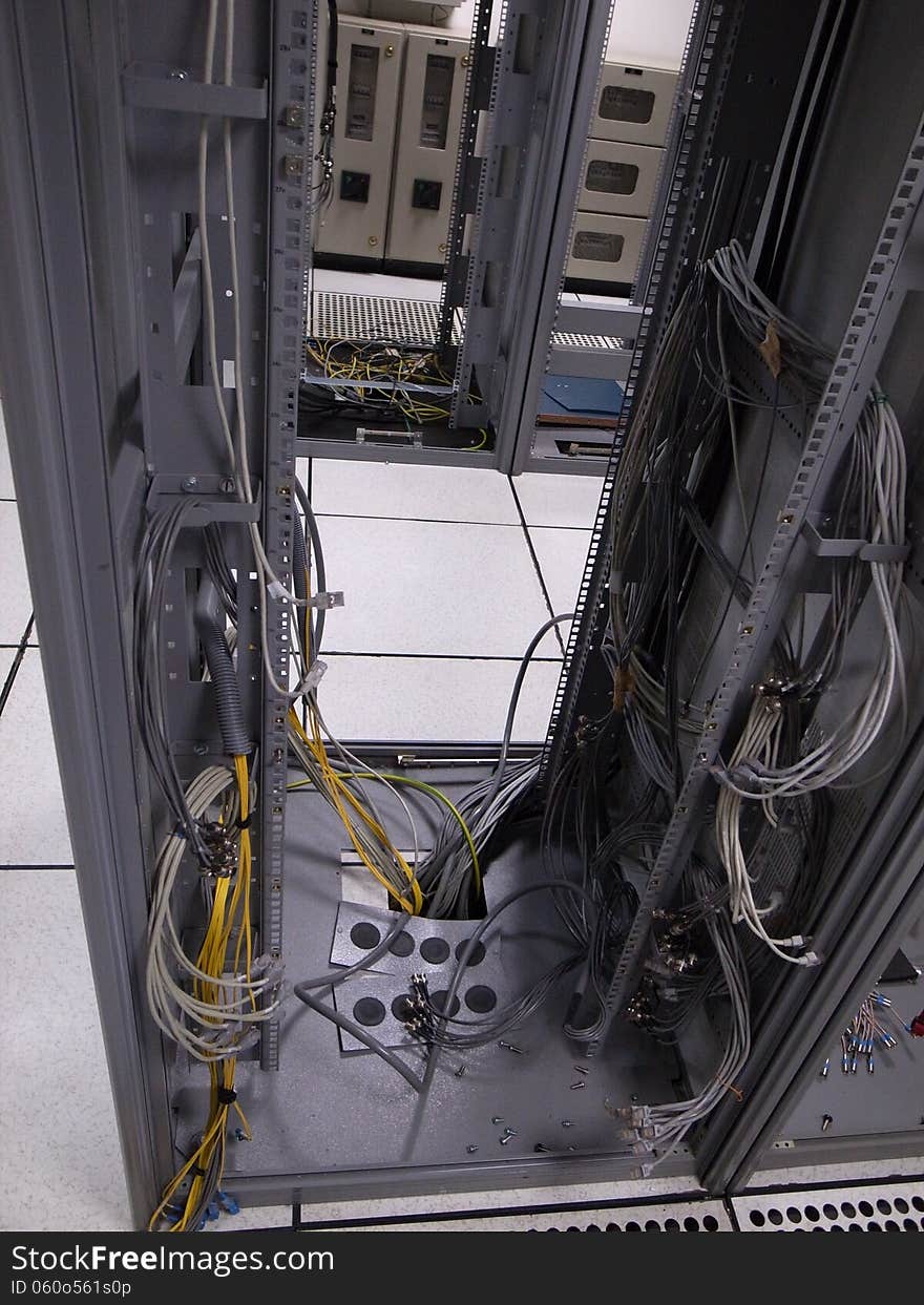 A typical setup of Data center. Old data Center rack with left behind cables.