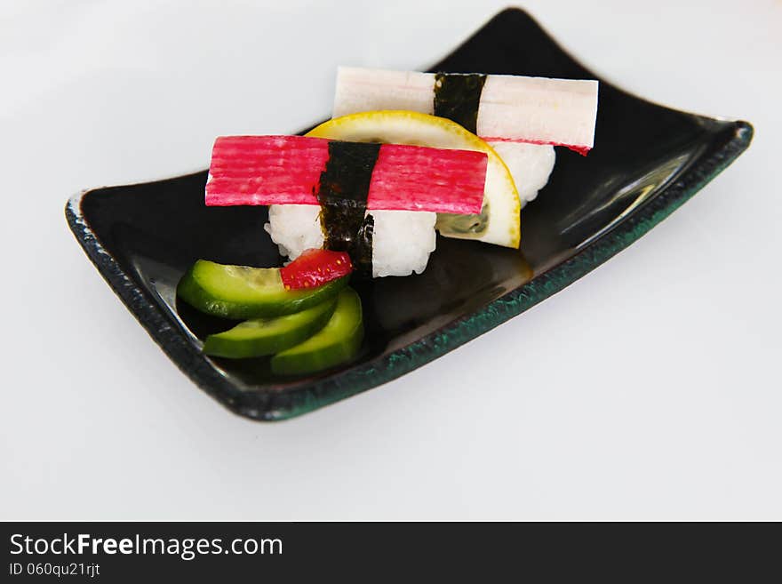 Nigiri sushi on the plate in restaurant. Nigiri sushi on the plate in restaurant