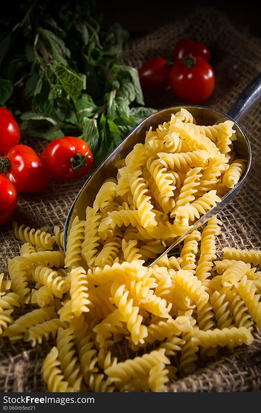 Raw pasta on complex background