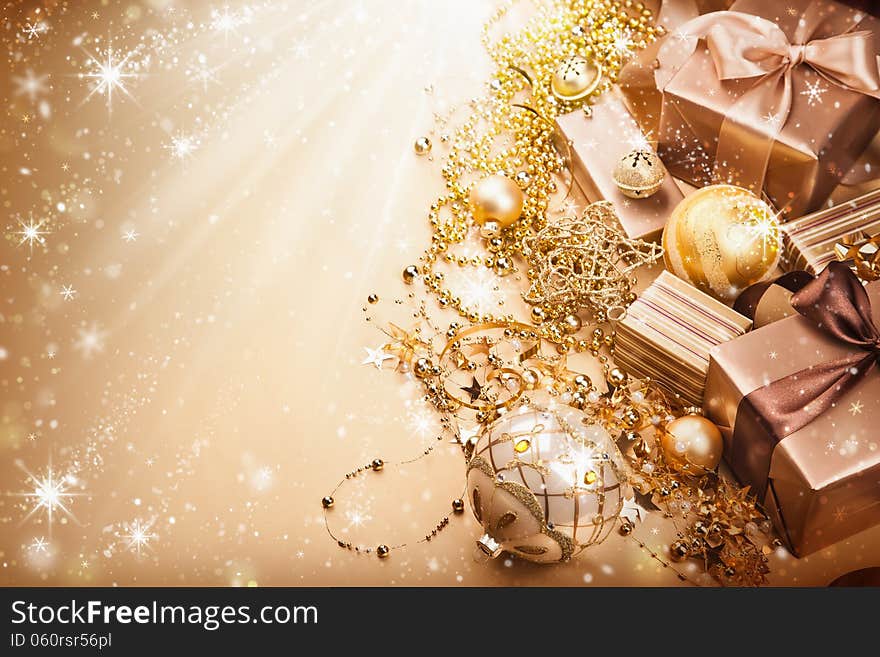 Holiday gifts and decorations on the magical background. Holiday gifts and decorations on the magical background