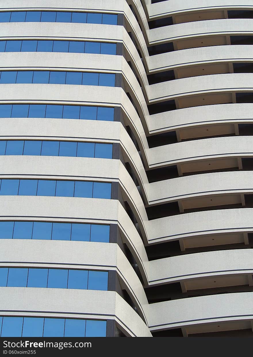 Modern office building in Brazil in closed from long focal lens perspective.