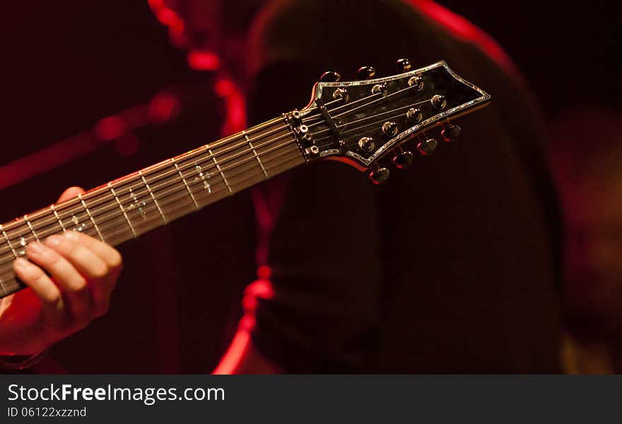 Guitarist silhouette performing on stage. Guitarist silhouette performing on stage