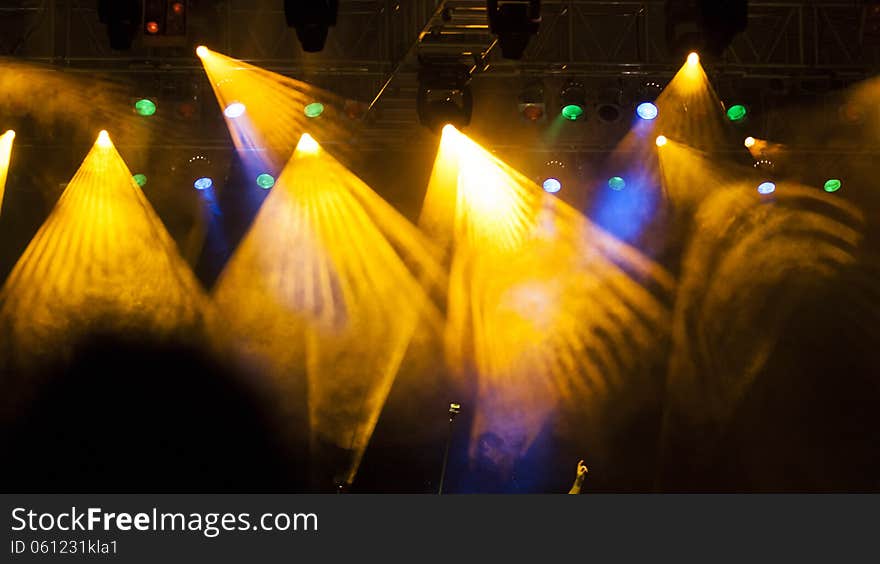 Stage lights and reflectors during concert. Stage lights and reflectors during concert