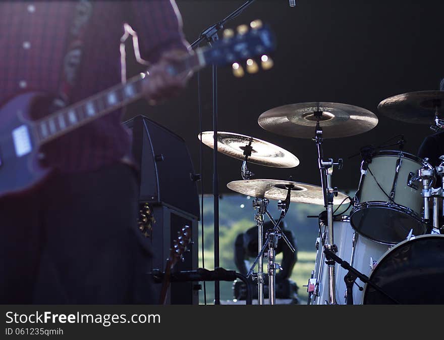 Guitarist silhouette performing on stage. Guitarist silhouette performing on stage