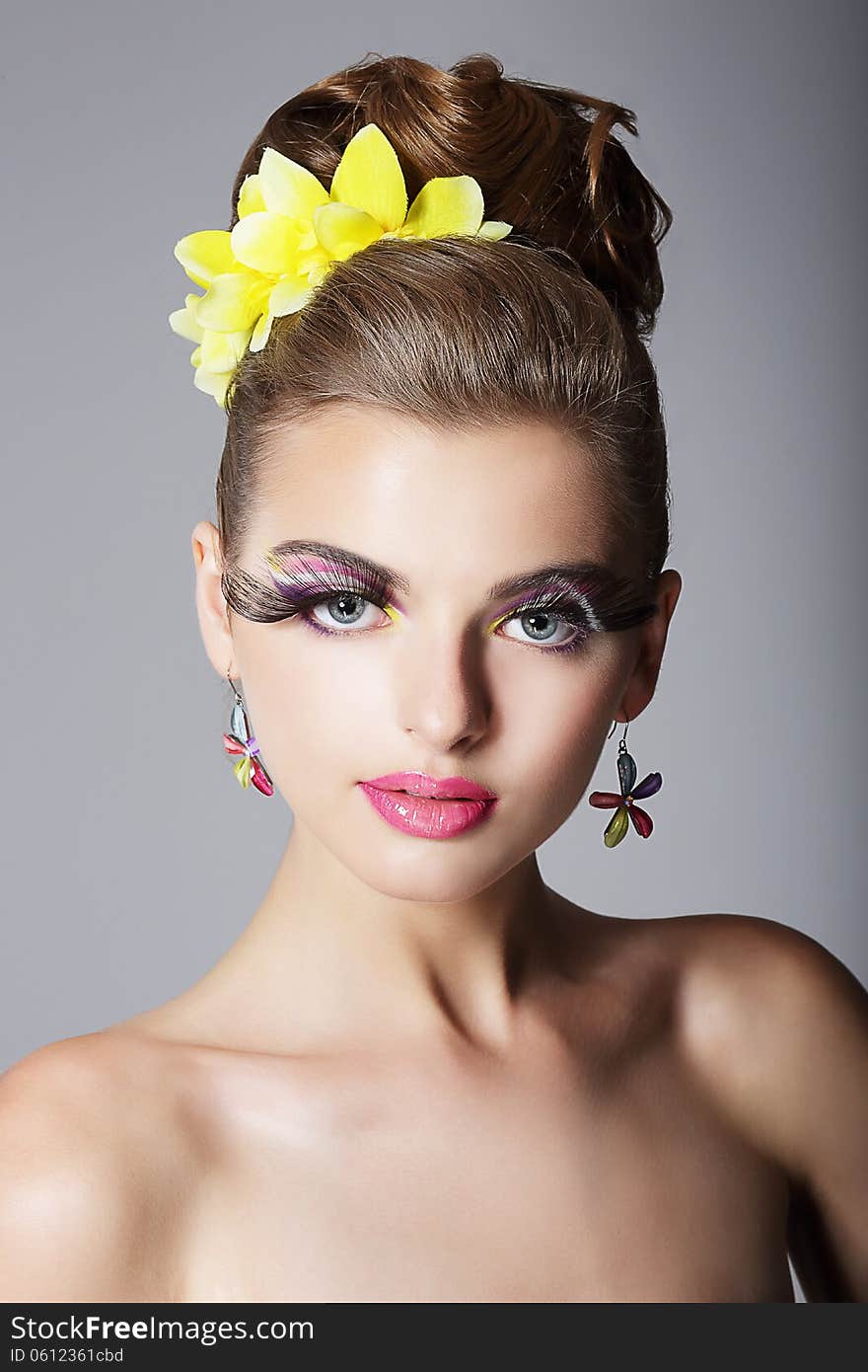 Eccentric Showy Woman with Vivid Colorful Makeup and False Long Eyelashes