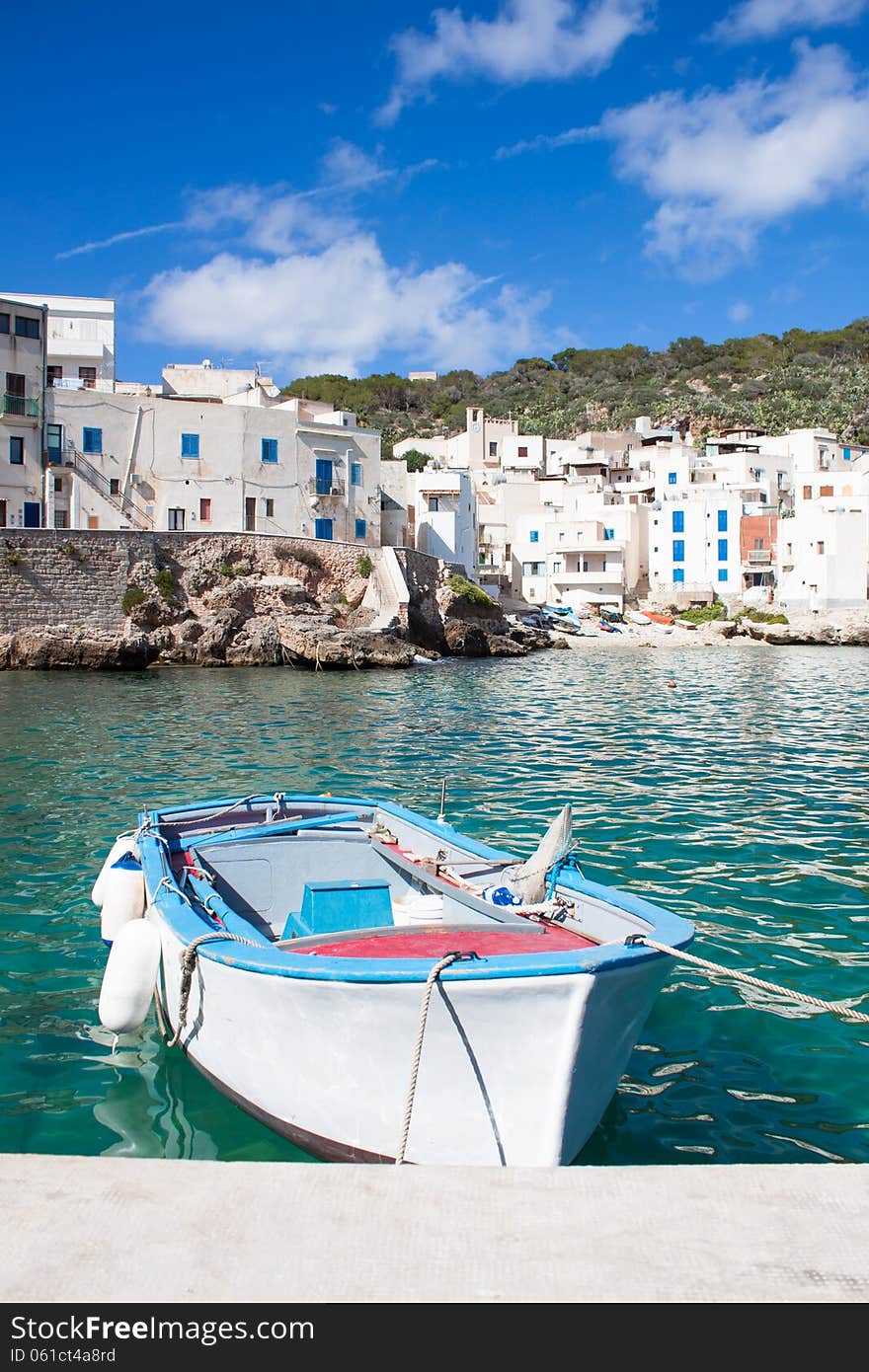 Fishing boat near a pier at Levanzo island, Sicily. Fishing boat near a pier at Levanzo island, Sicily