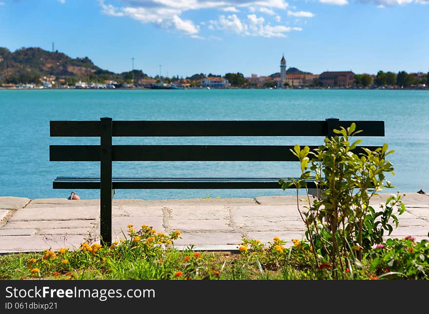 Bench On The Shore Of A Bay