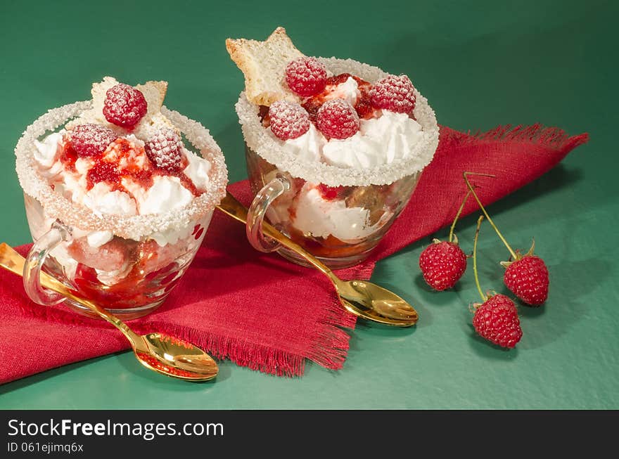 Christmas dessert in a glass with decoration. From series Cranberry-raspberry trifle