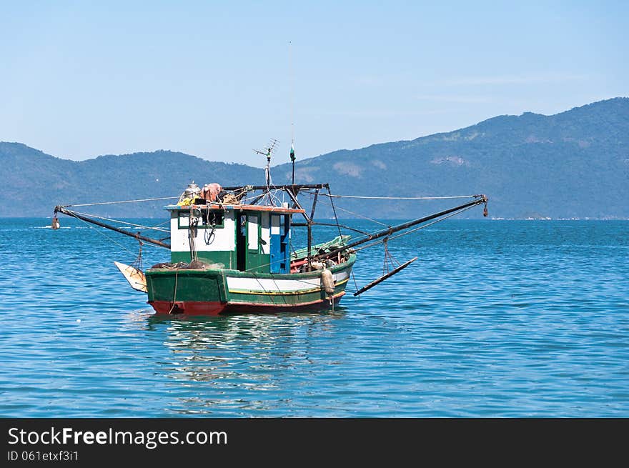 Fisherman boat in the bay near Ilha Grande island in Brazil.