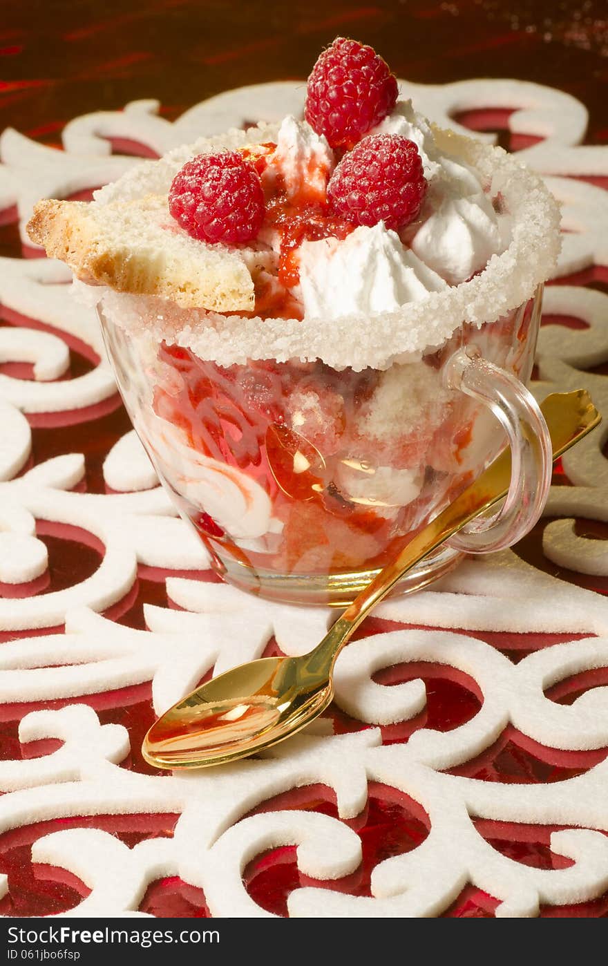 Christmas dessert in a glass with decoration. From series Cranberry-raspberry trifle